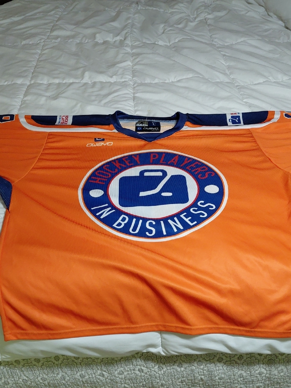 Hockey Players in Business Orange Hockey Jersey